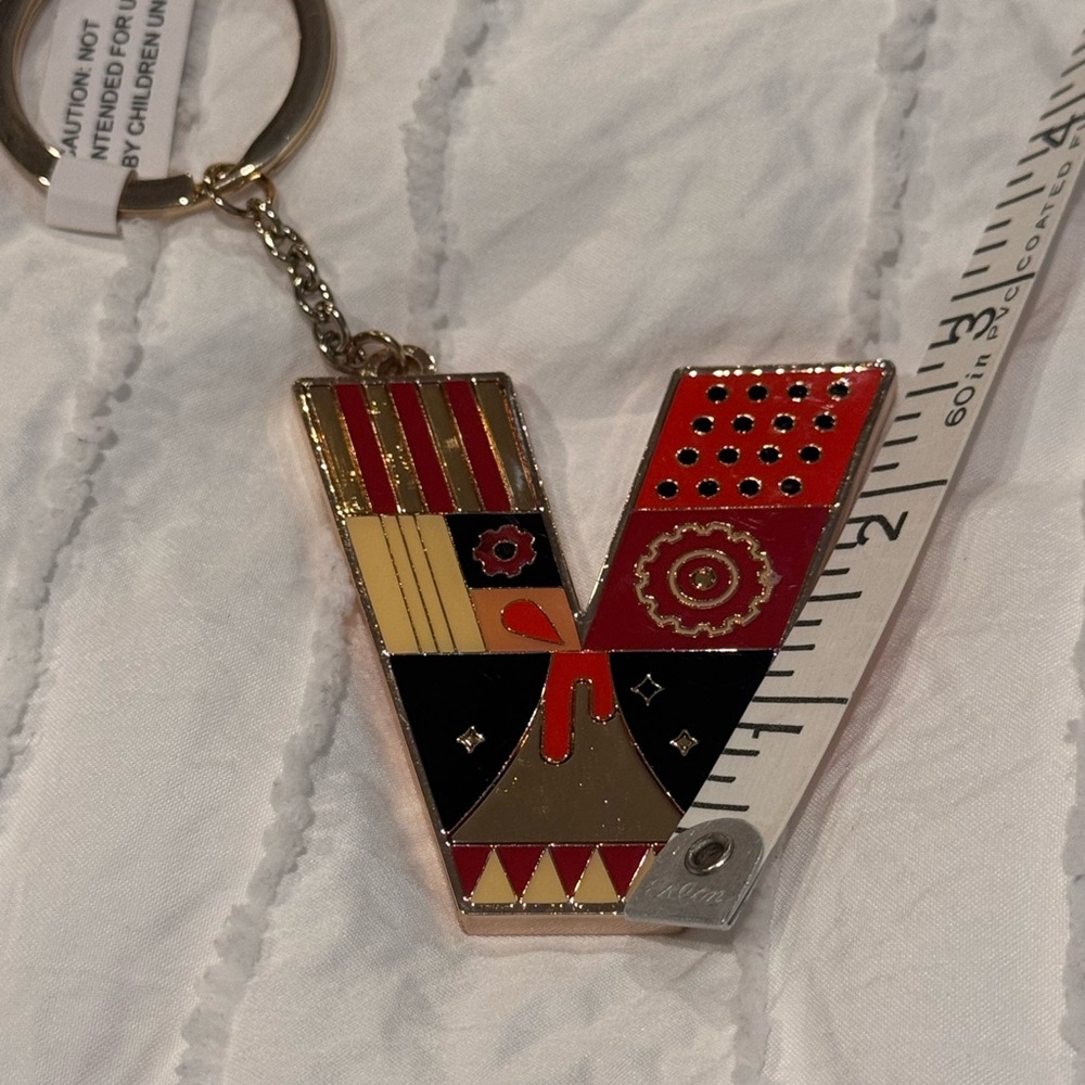 FAO schwarz, Enamel V-Shaped Keychain Charm – Red, Black & Gold, NWT